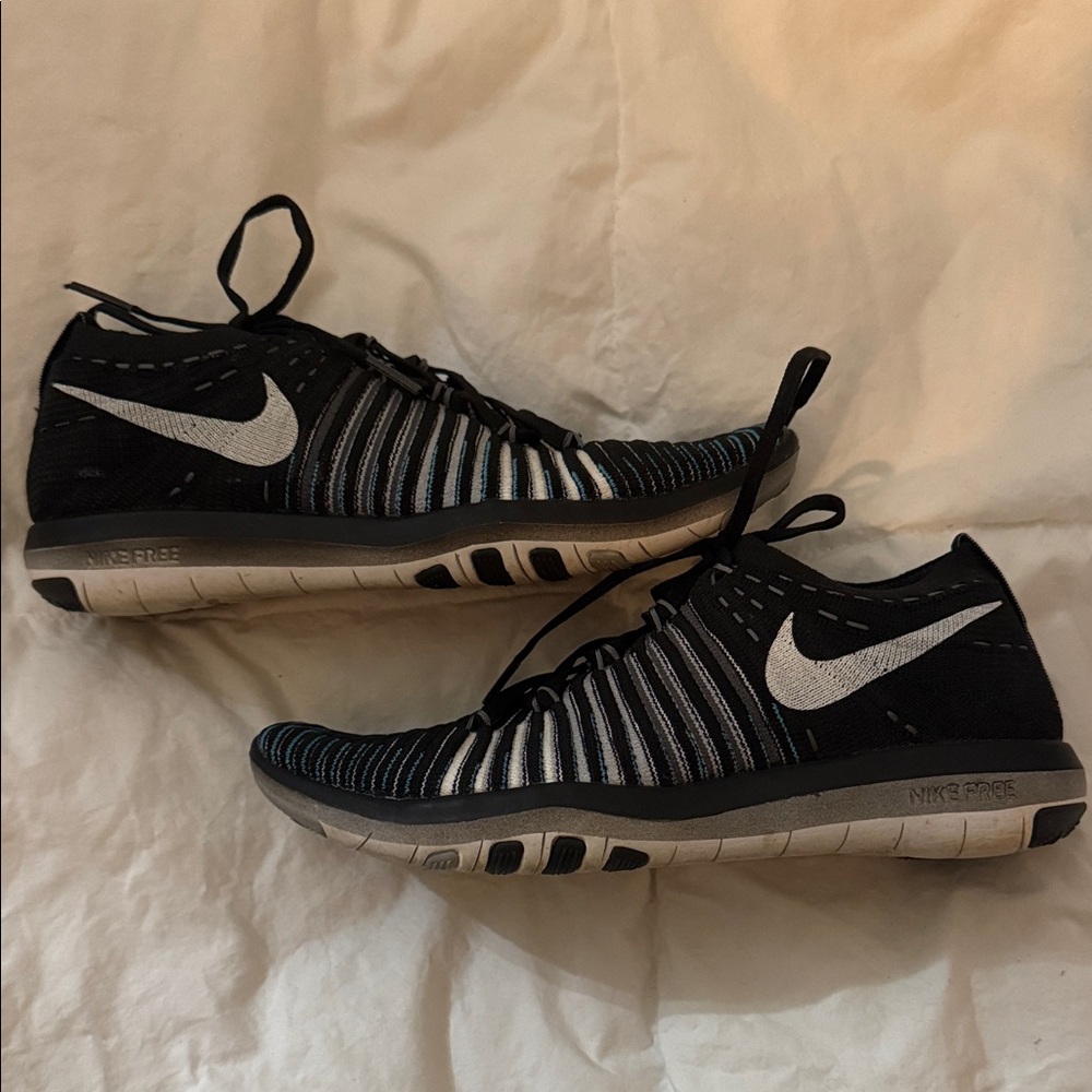 Nike Black and White with Blue Free Transform Flynit Athletic Sneakers